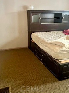 28826 Largo Vista Road Llano, CA 93544 - Photo 6 of 10 a bed sitting in a bedroom next to a cabinet