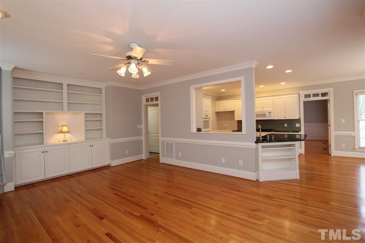 7121 Trenton Ridge Court Raleigh, NC 27613 - Photo 12 of 25 a view of an empty room with kitchen and window