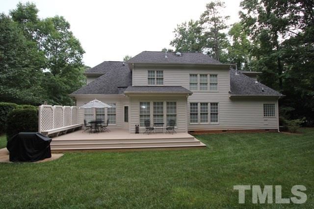 7121 Trenton Ridge Court Raleigh, NC 27613 - Photo 25 of 25 a front view of a house with a garden and yard