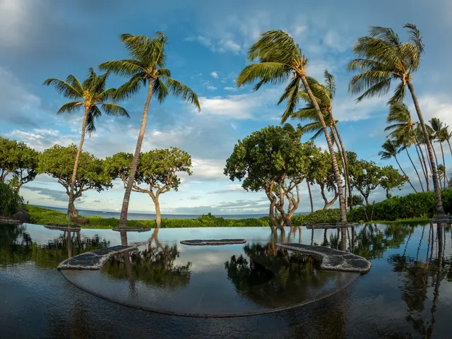 a view of a pool an ocean view