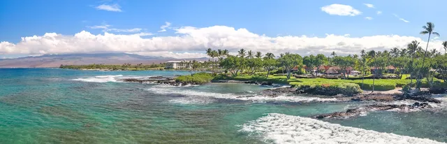 a view of a lake with a yard