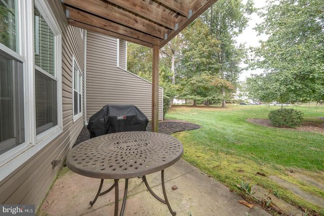 a view of a back yard of the house