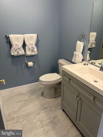 a bathroom with a toilet and a sink