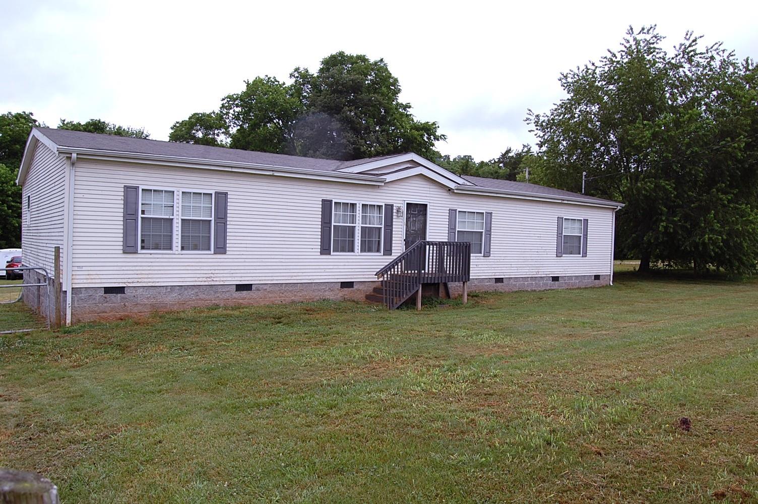 1773 Monsanto Road Columbia, TN 38401 - Photo 1 of 11 a view of a house with a backyard