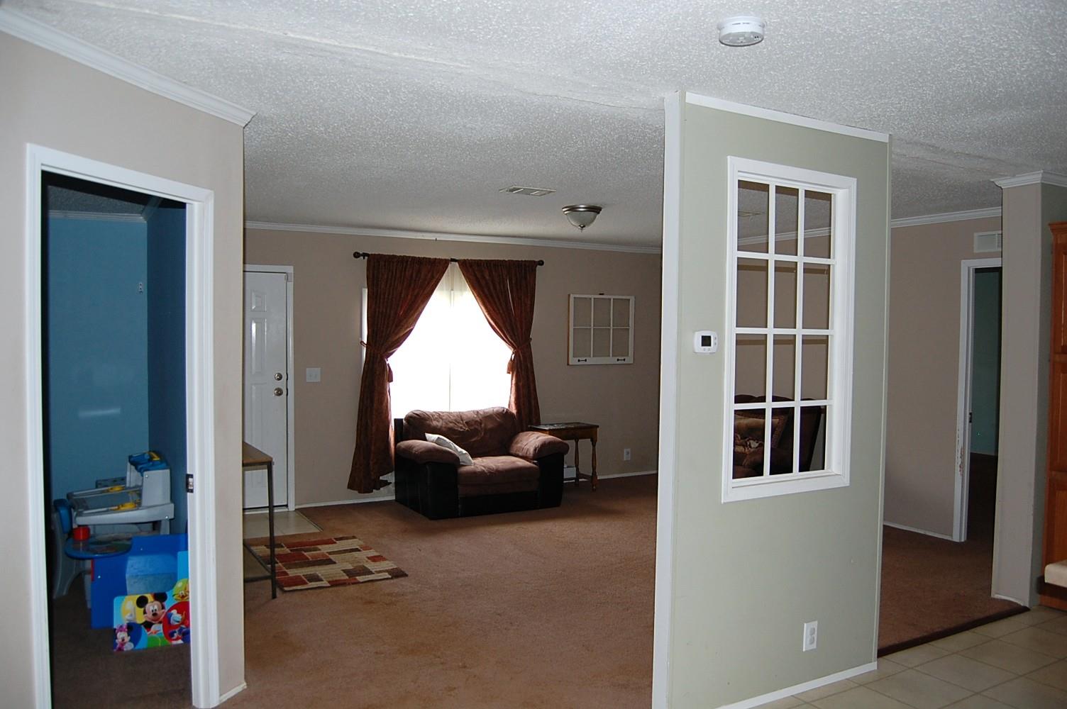 1773 Monsanto Road Columbia, TN 38401 - Photo 11 of 11 a living room with furniture and a window