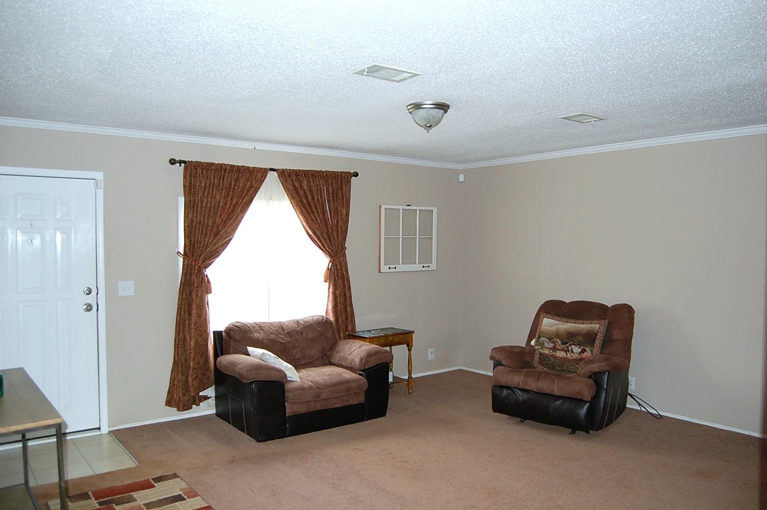 1773 Monsanto Road Columbia, TN 38401 - Photo 3 of 11 a living room with furniture and a window