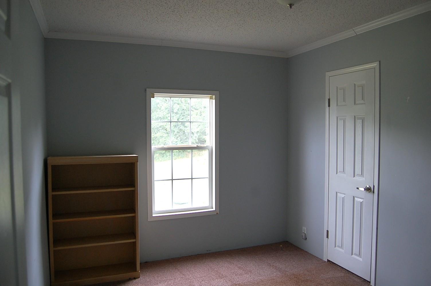 1773 Monsanto Road Columbia, TN 38401 - Photo 9 of 11 an empty room with a window