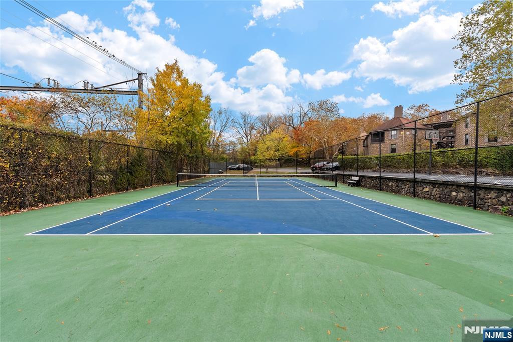 181 Long Hill Road, Unit 116 Little Falls, NJ 07424 - Photo 16 of 19 a view of a tennis court
