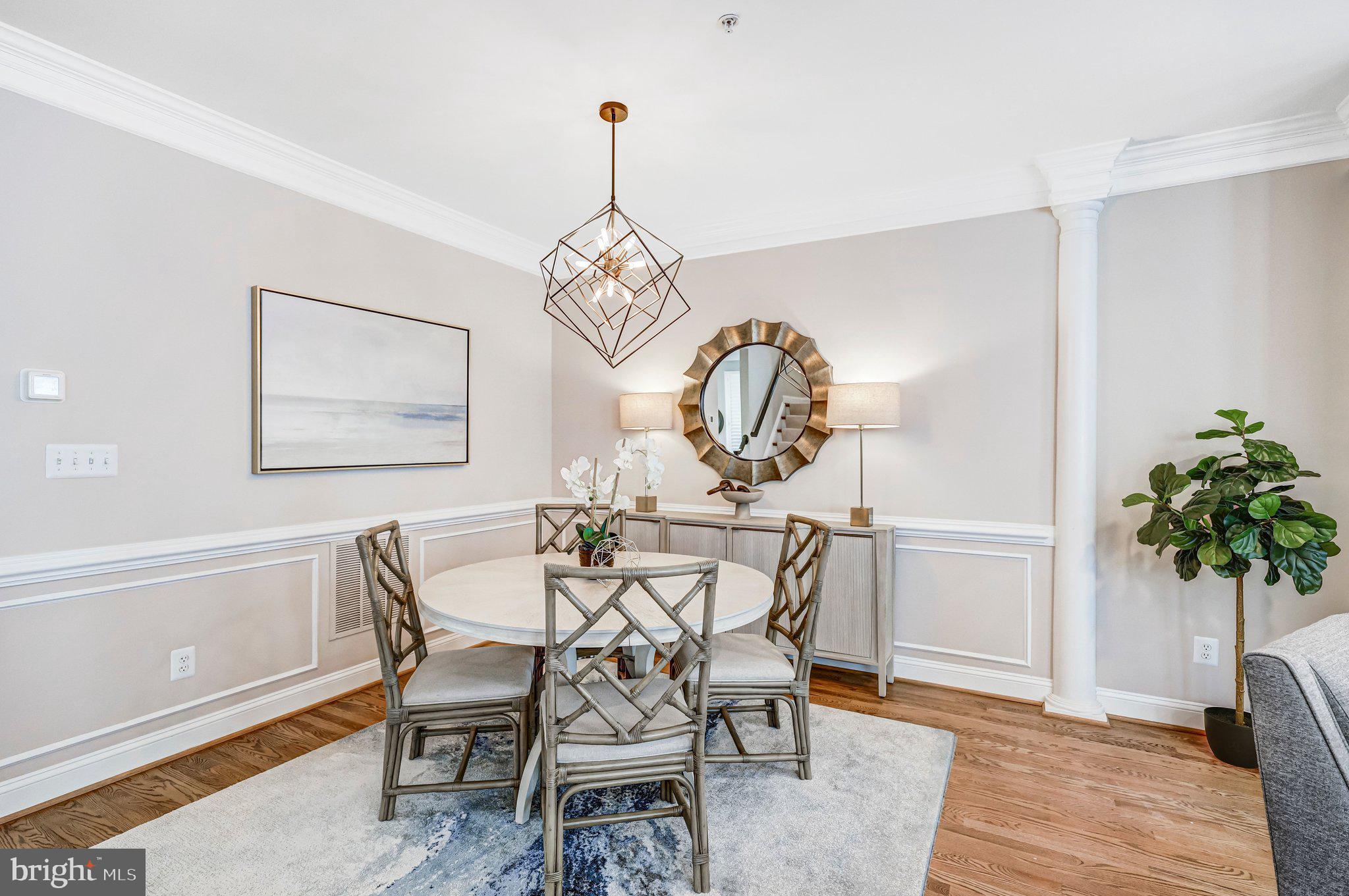 17 Alexander Street Alexandria, VA 22314 - Photo 8 of 49 a view of a dining room with furniture and chandelier