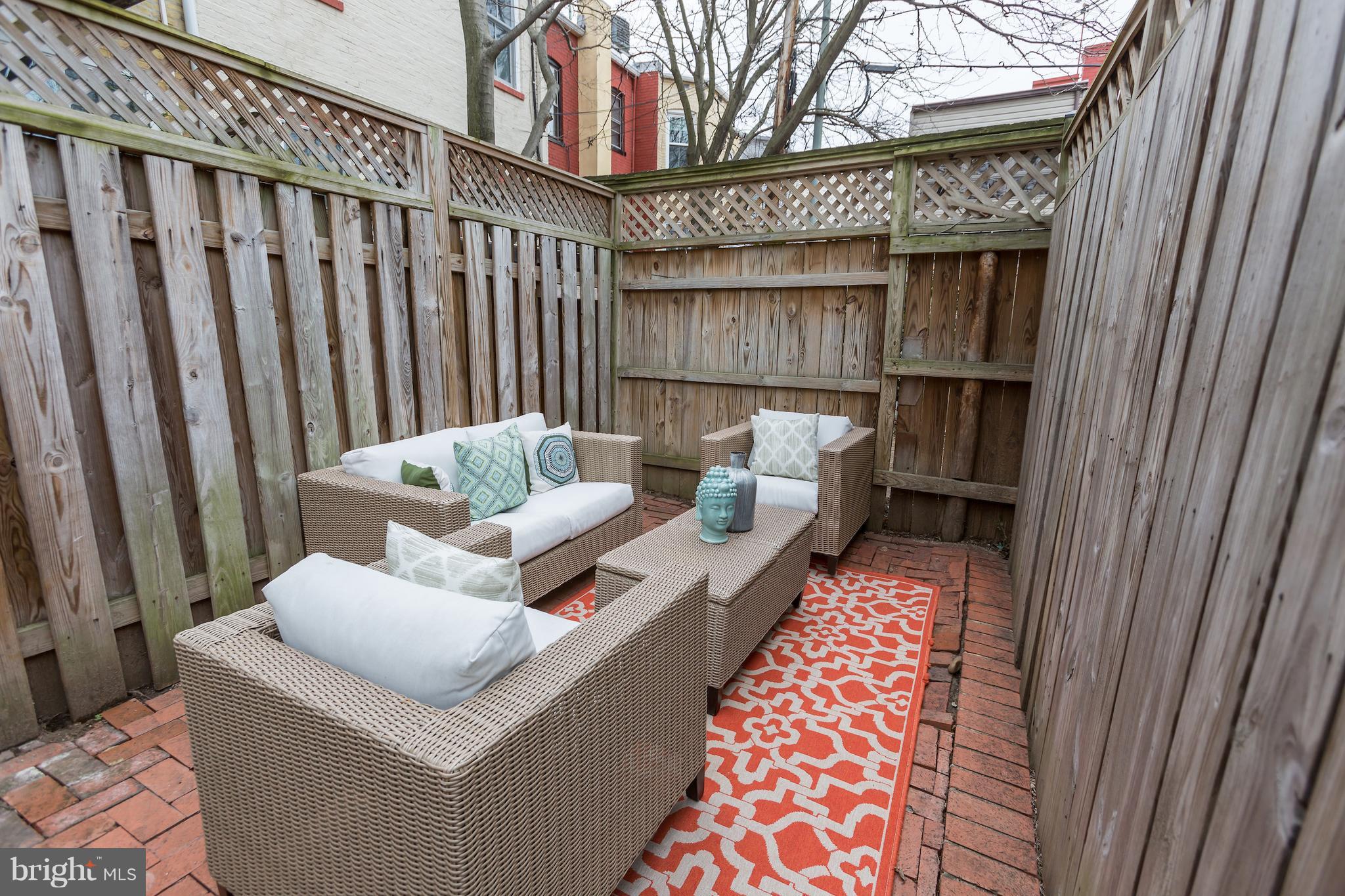 437 2nd Street Southeast, Unit 2B Washington, DC 20003 - Photo 18 of 20 a view of a porch with furniture