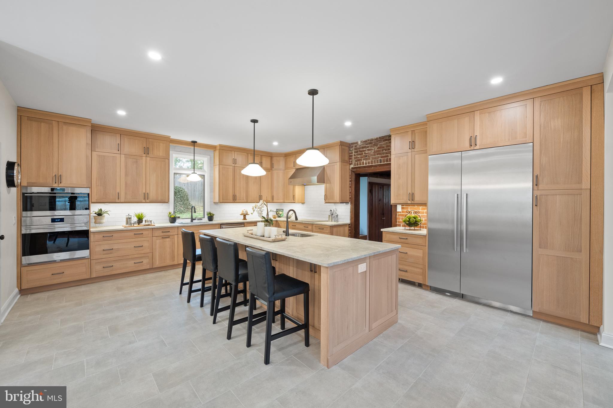 734 Brooke Road Wayne, PA 19087 - Photo 15 of 50 Honed quartzite counters