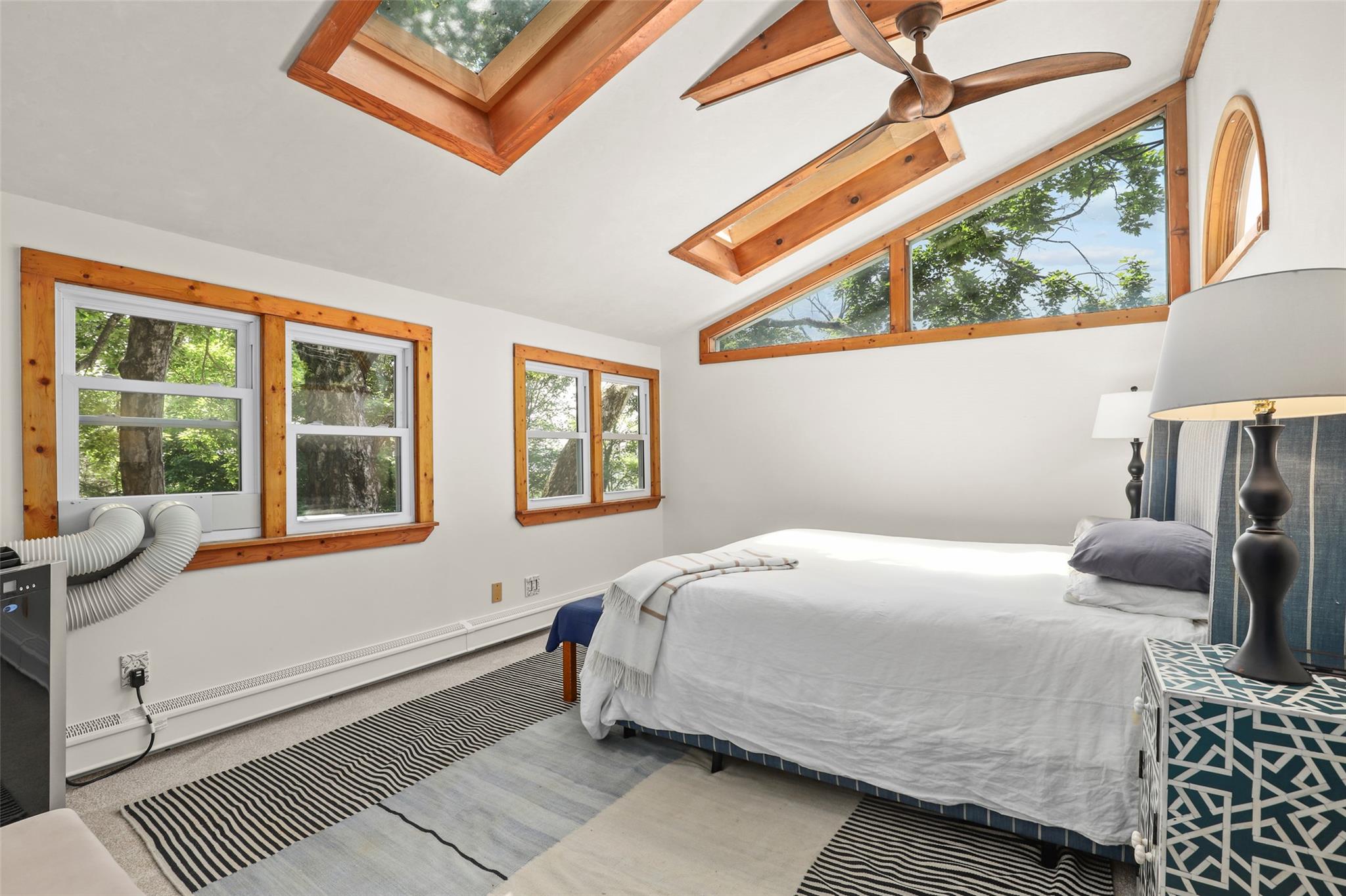 3841 Indian Hill Road Shrub Oak, NY 10588 - Photo 11 of 29 a bedroom with a bed and wooden floor