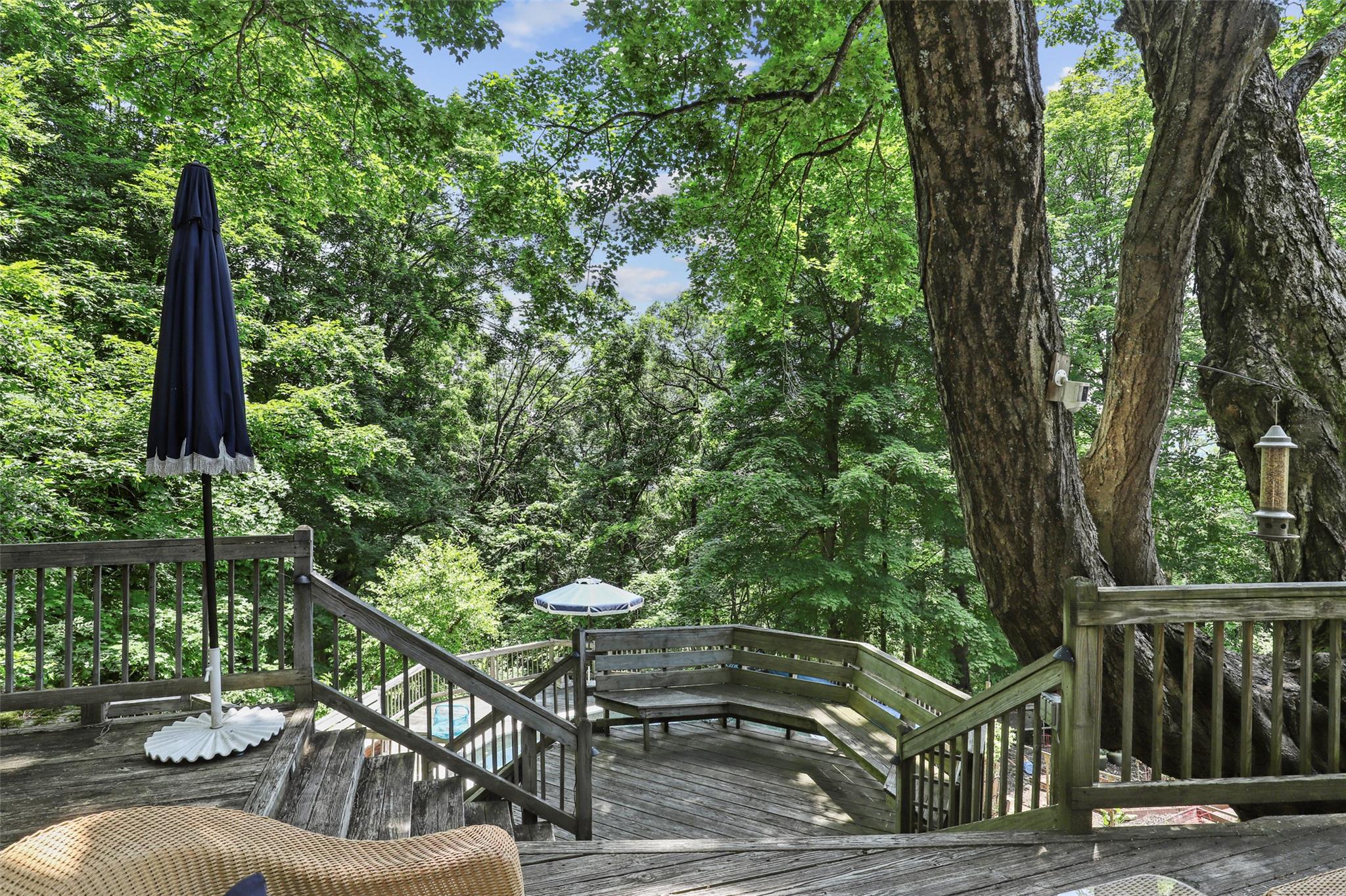3841 Indian Hill Road Shrub Oak, NY 10588 - Photo 22 of 29 a view of a couches and a table in the patio