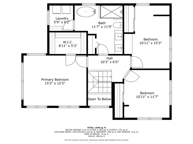 a picture of a book and a white bed