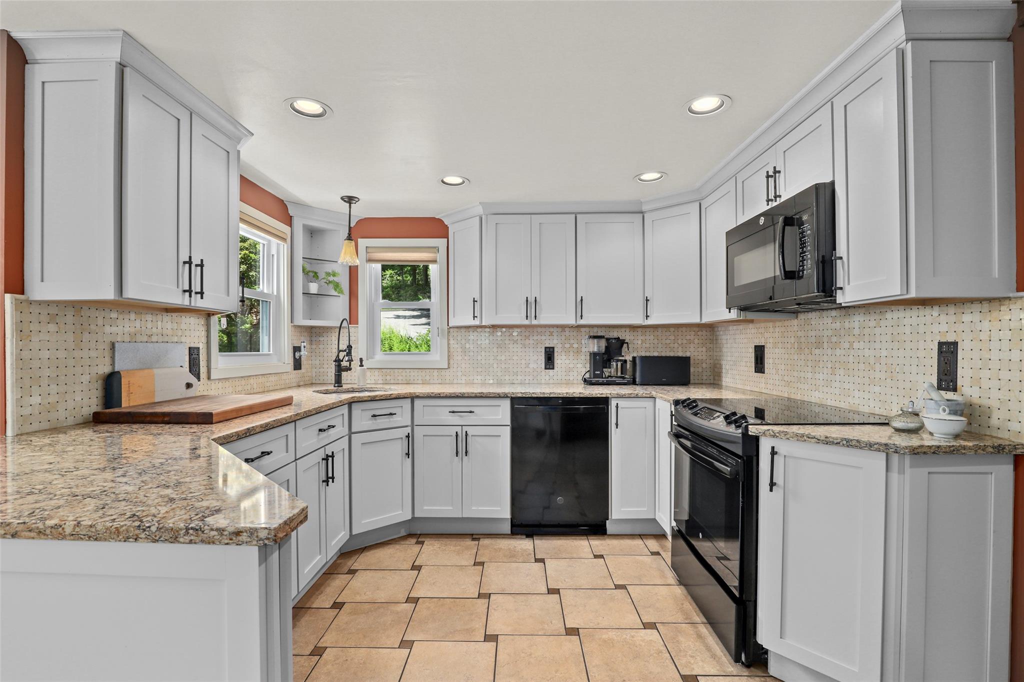 3841 Indian Hill Road Shrub Oak, NY 10588 - Photo 9 of 29 a kitchen with a stove sink and cabinets