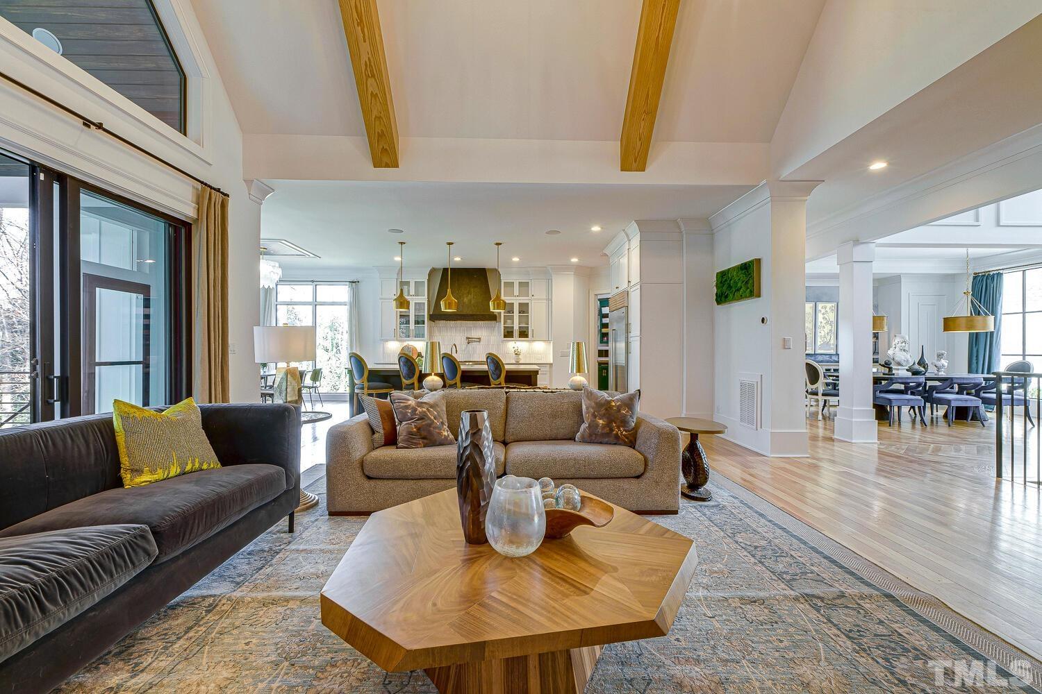 3521 Blue Ridge Road Raleigh, NC 27612 - Photo 13 of 100 a living room with furniture and a large window