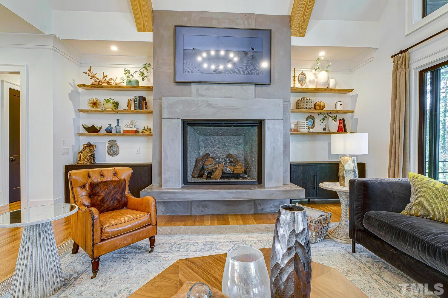 3521 Blue Ridge Road Raleigh, NC 27612 - Photo 14 of 100 a living room with furniture and a fireplace