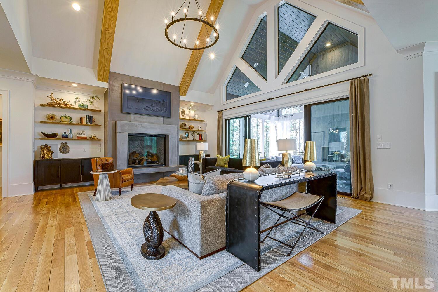 3521 Blue Ridge Road Raleigh, NC 27612 - Photo 15 of 100 a living room with fireplace furniture and a wooden floor