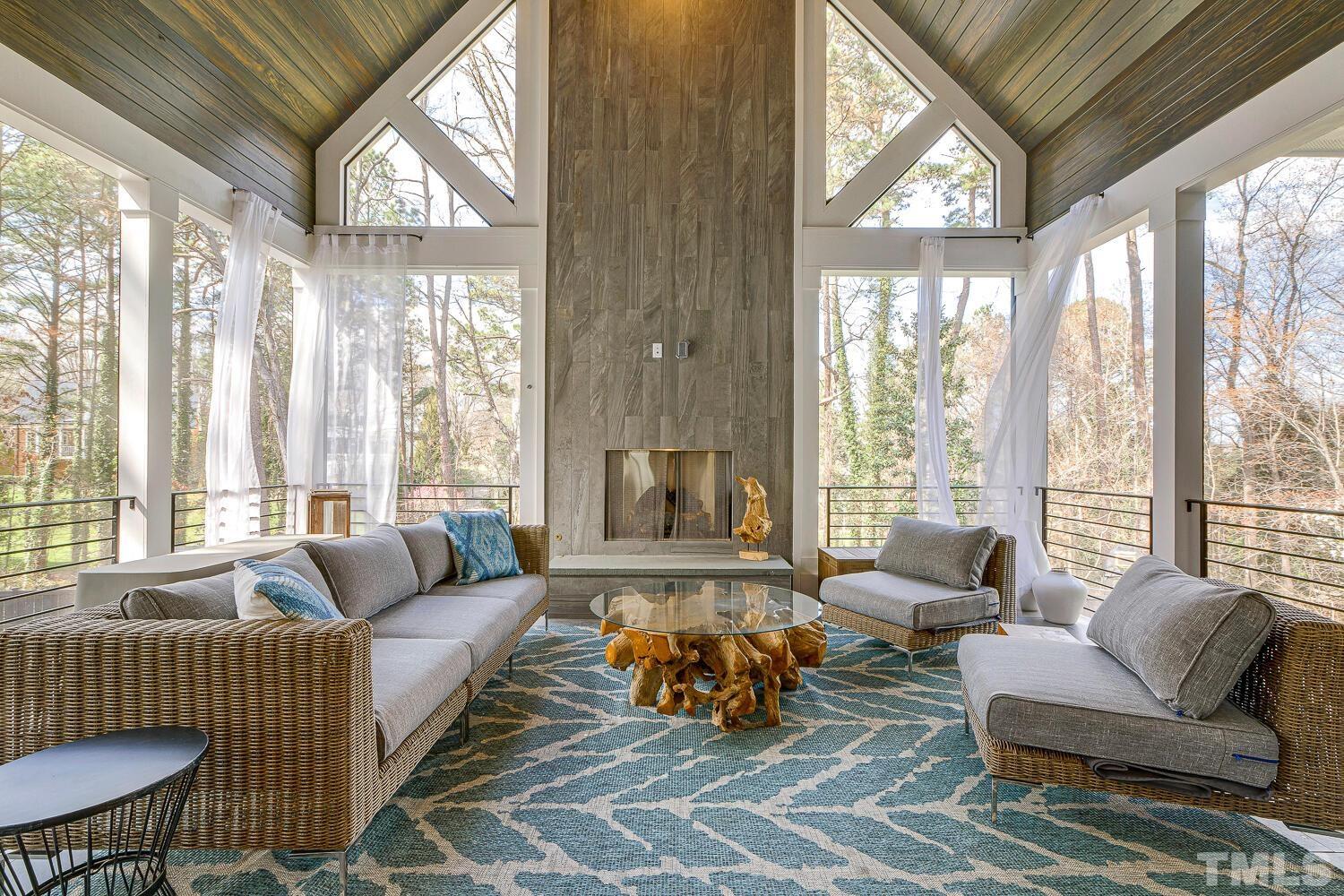 3521 Blue Ridge Road Raleigh, NC 27612 - Photo 17 of 100 a living room with furniture and a large window