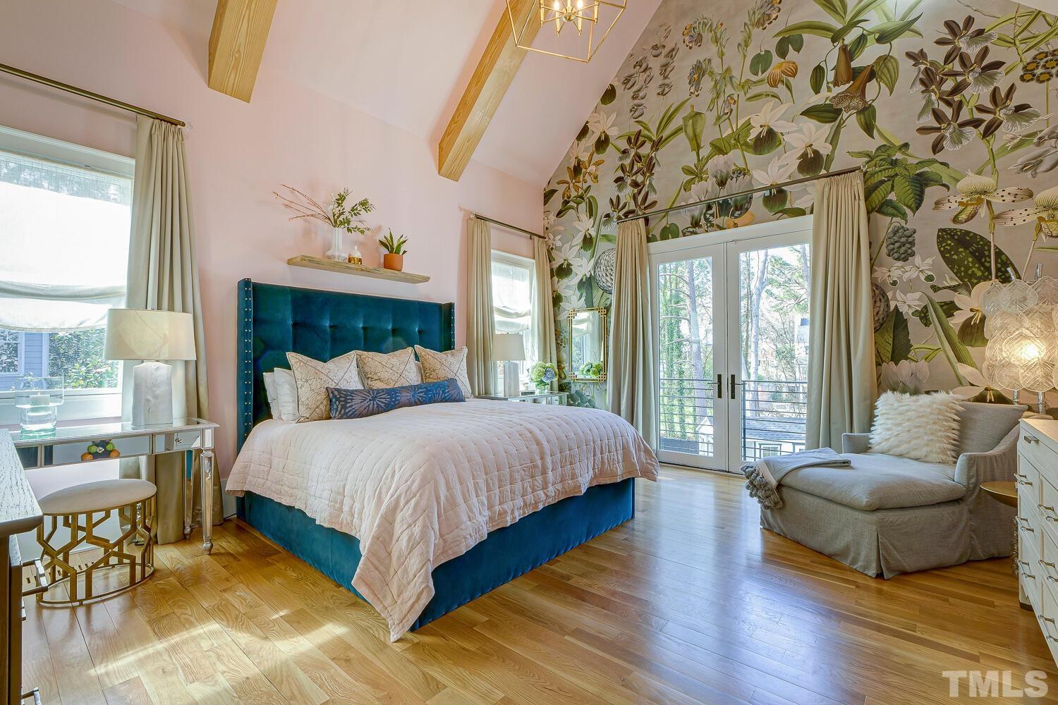 3521 Blue Ridge Road Raleigh, NC 27612 - Photo 39 of 100 a bedroom with a bed and wooden floor