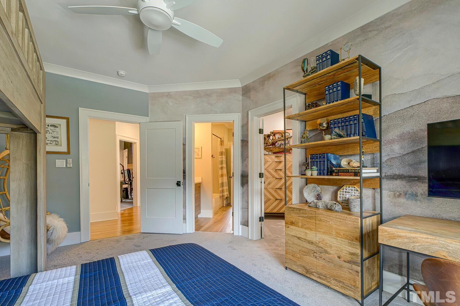 3521 Blue Ridge Road Raleigh, NC 27612 - Photo 57 of 100 a view of an entryway with wooden floor and furniture
