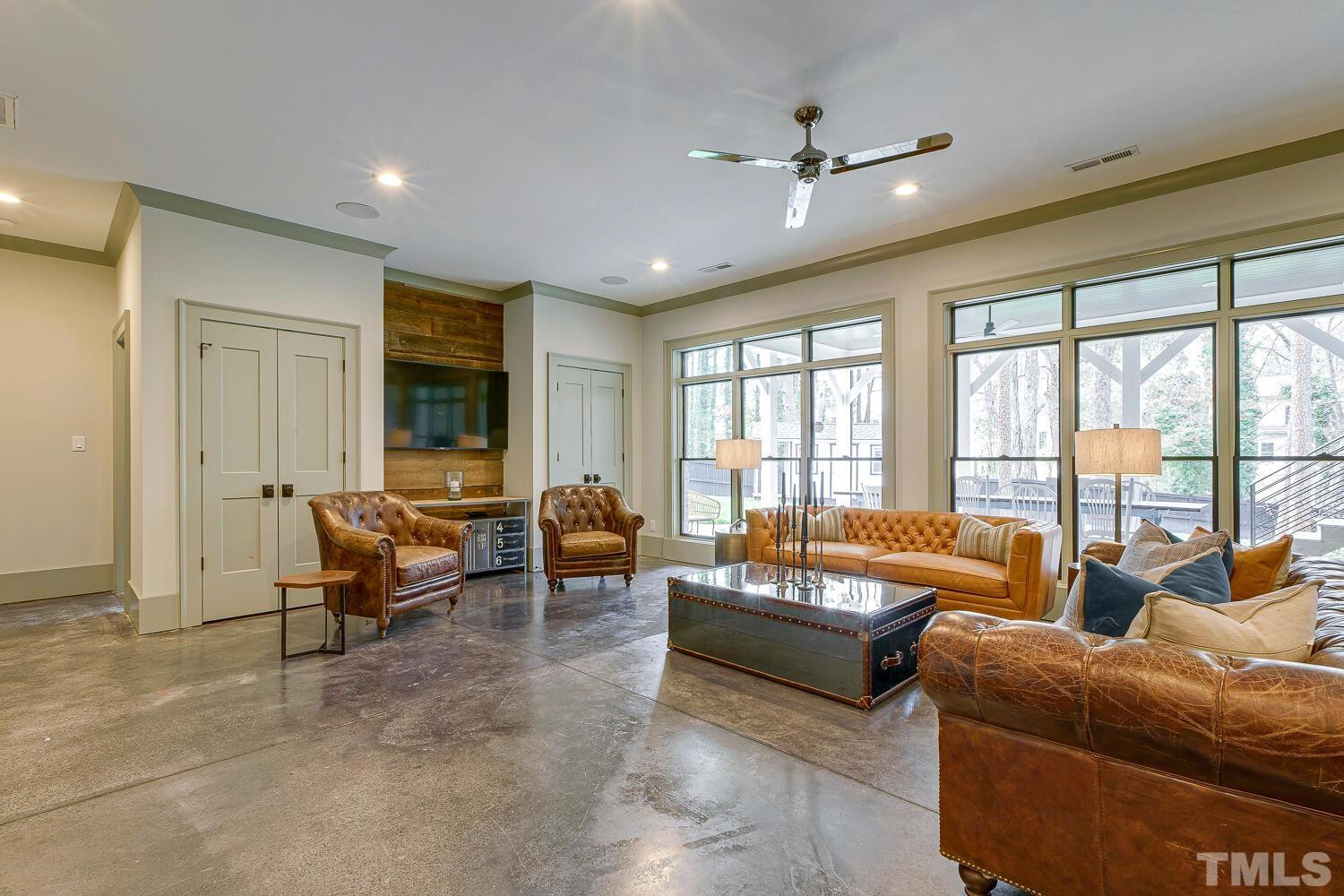 3521 Blue Ridge Road Raleigh, NC 27612 - Photo 78 of 100 a living room with furniture and a large window