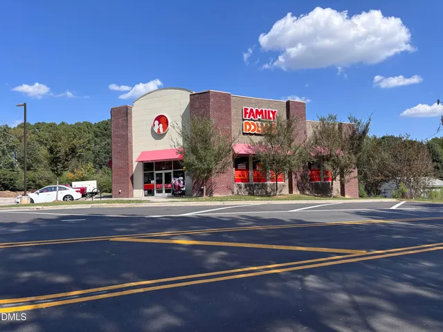 a view of a building with a street