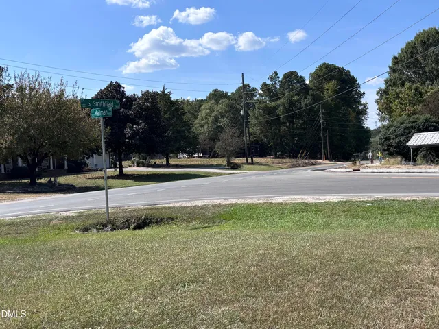 a view of road with trees