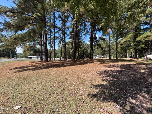 a view of road with trees