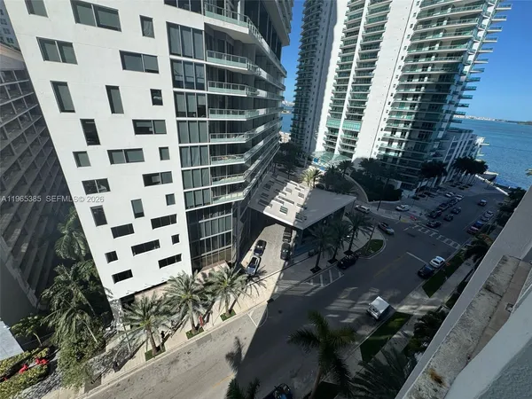 a view of a balcony with sitting area