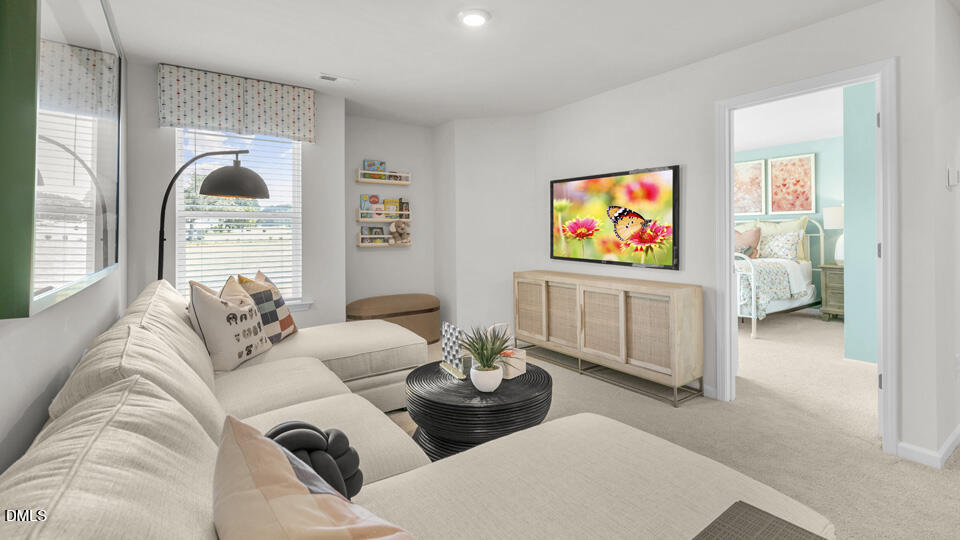 8 Tiger Eye Drive Clayton, NC 27520 - Photo 16 of 37 a living room with furniture and a large window