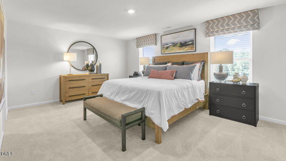 8 Tiger Eye Drive Clayton, NC 27520 - Photo 20 of 37 a bedroom with bed and window