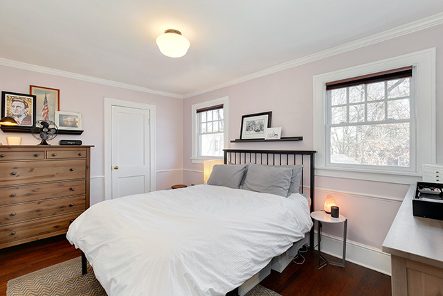 552 North York Road Hinsdale, IL 60521 - Photo 29 of 41 a bedroom with a bed and a flat tv screen on dresser