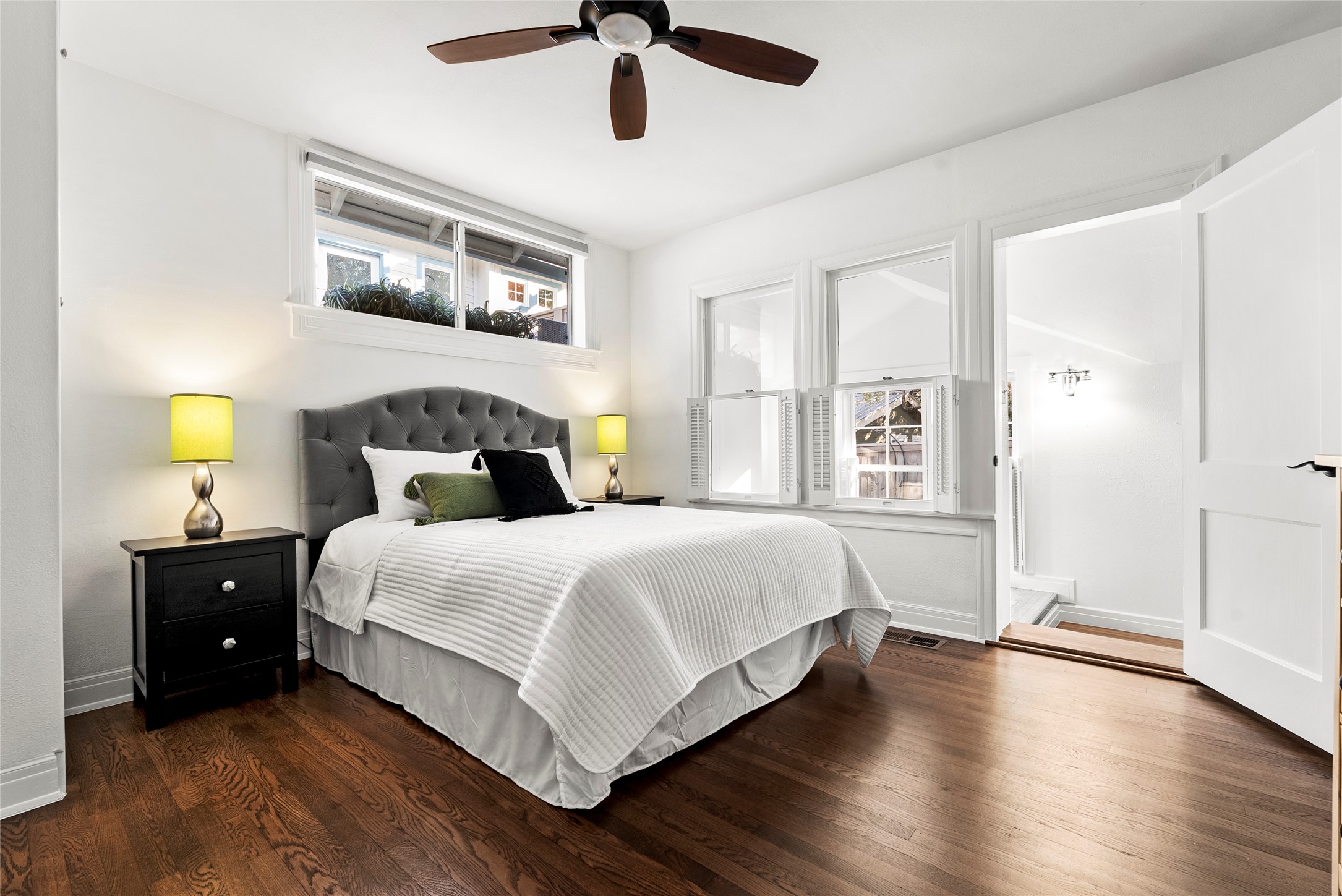 1507 Newning Avenue Austin, TX 78704 - Photo 15 of 37 Ensuite Bedroom with hardwood wood floors and a ceiling fan