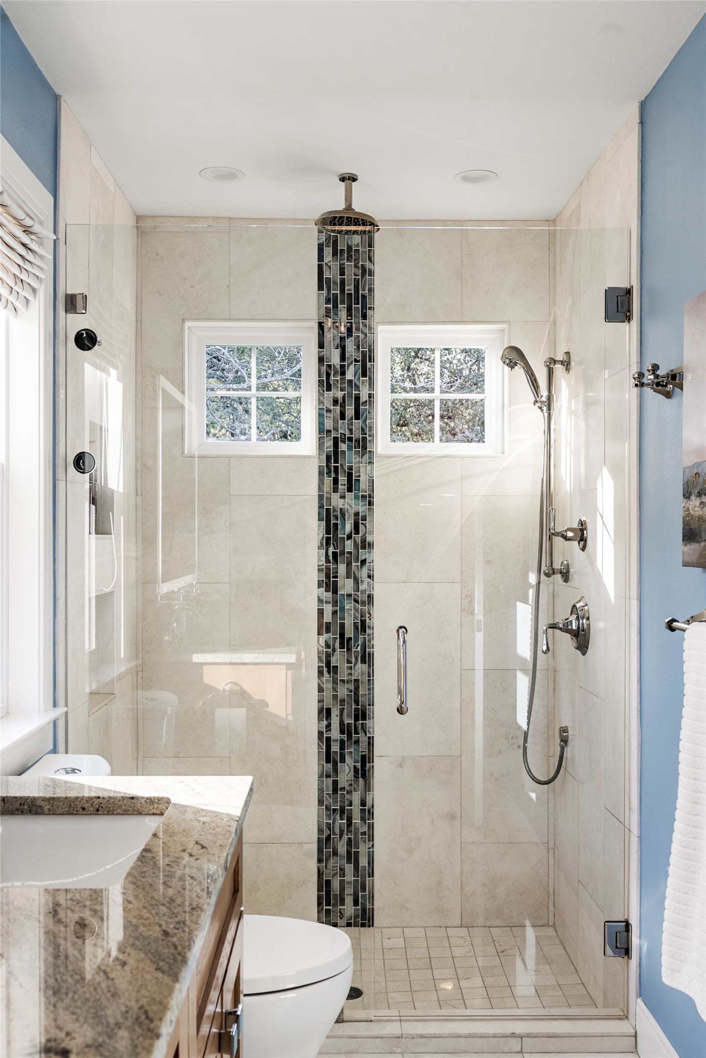 1507 Newning Avenue Austin, TX 78704 - Photo 29 of 37 Full bathroom featuring vanity, a stall shower, and healthy amount of natural light