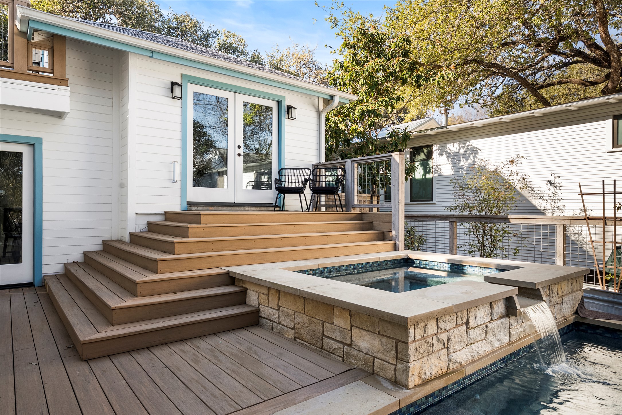 1507 Newning Avenue Austin, TX 78704 - Photo 31 of 37 Wooden deck featuring french doors, an outdoor hot tub, and stairway