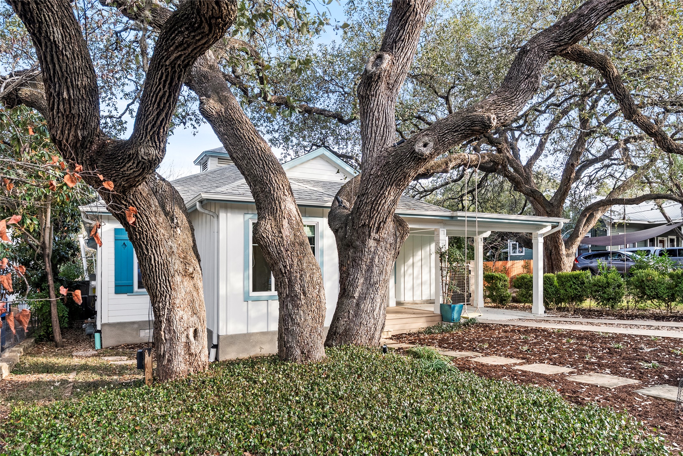 1507 Newning Avenue Austin, TX 78704 - Photo 35 of 37 View of front of home featuring roof with shingles, covered porch, and board and batten siding