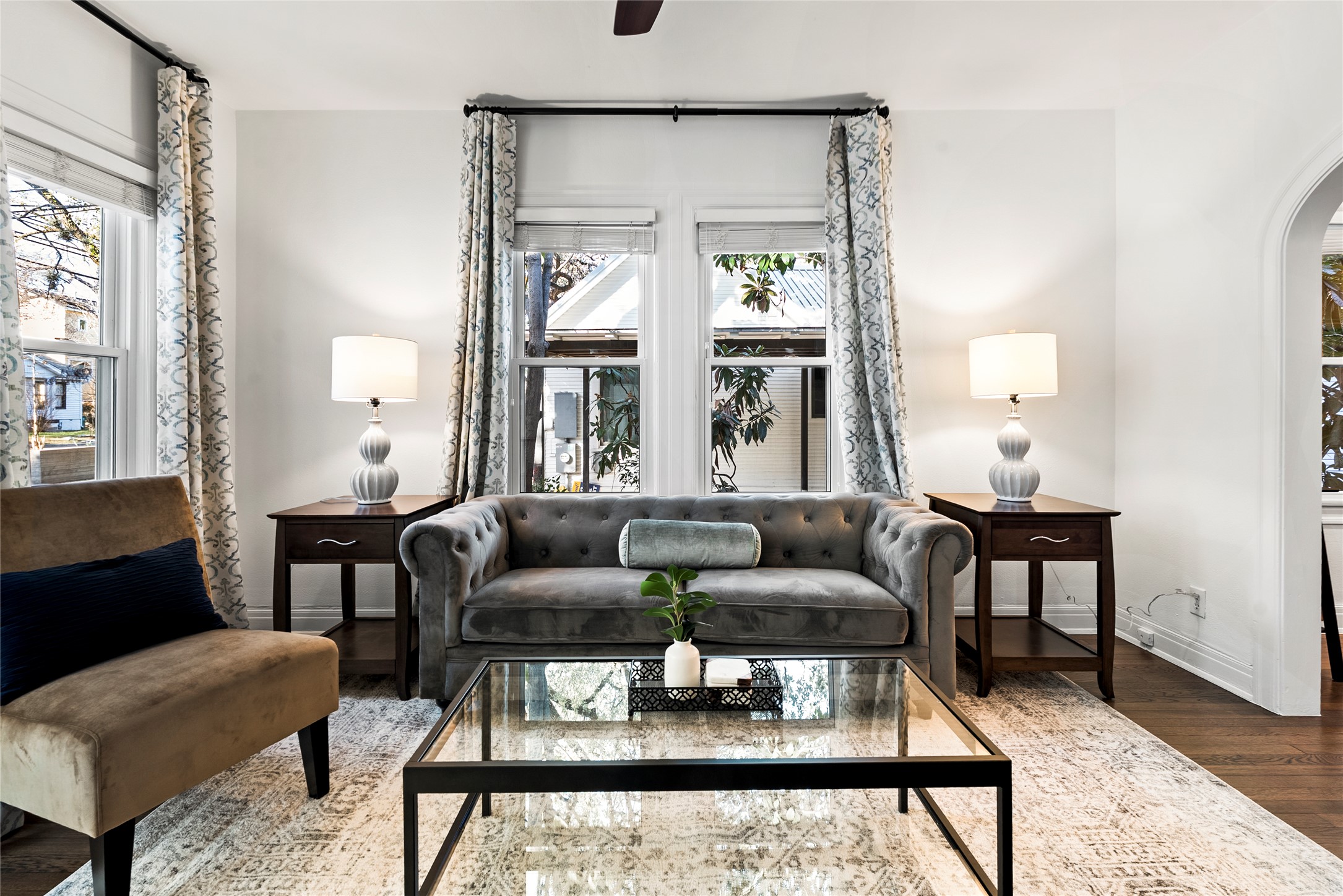 1507 Newning Avenue Austin, TX 78704 - Photo 5 of 37 Living area featuring wood finished floors and arched doorways
