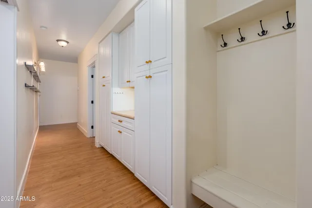 a bathroom with a sink and a window