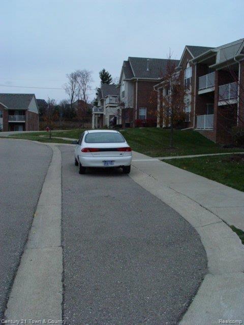 1836 Flagstone Circle, Unit 43 Rochester, MI 48307 - Photo 16 of 18 EXTRA PARKING OUT FRONT
