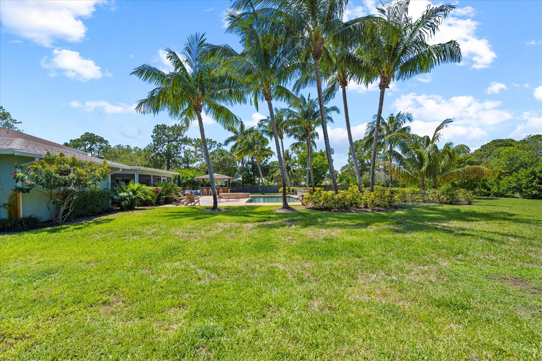 5895 Keith Road Jupiter, FL 33458 - Photo 43 of 51 a view of a park and palm trees