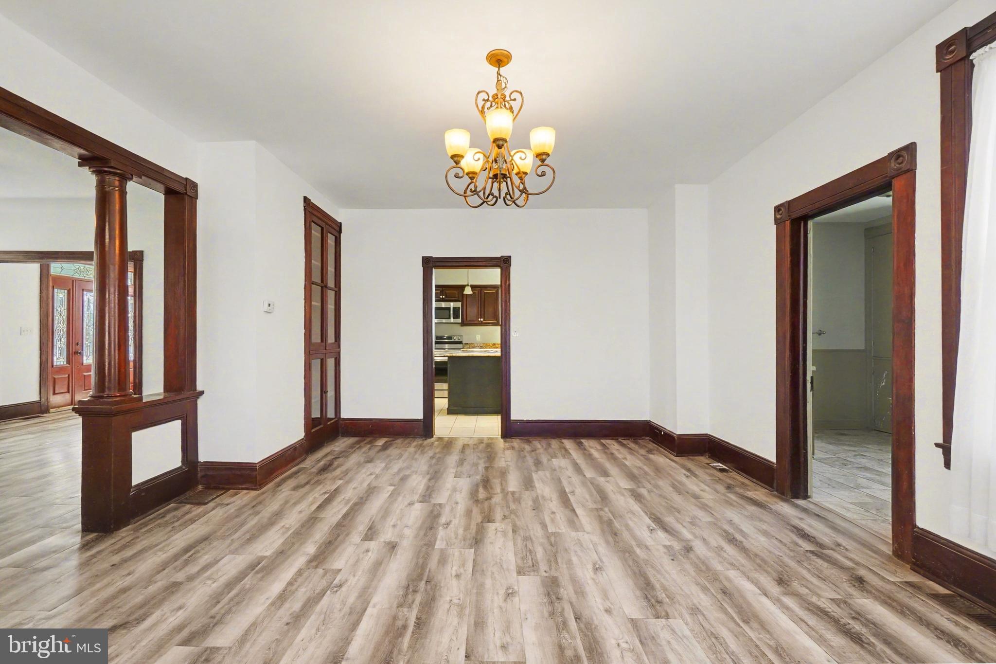 2322 Rock Spring Road Forest Hill, MD 21050 - Photo 14 of 39 wooden floor in an empty room with a window