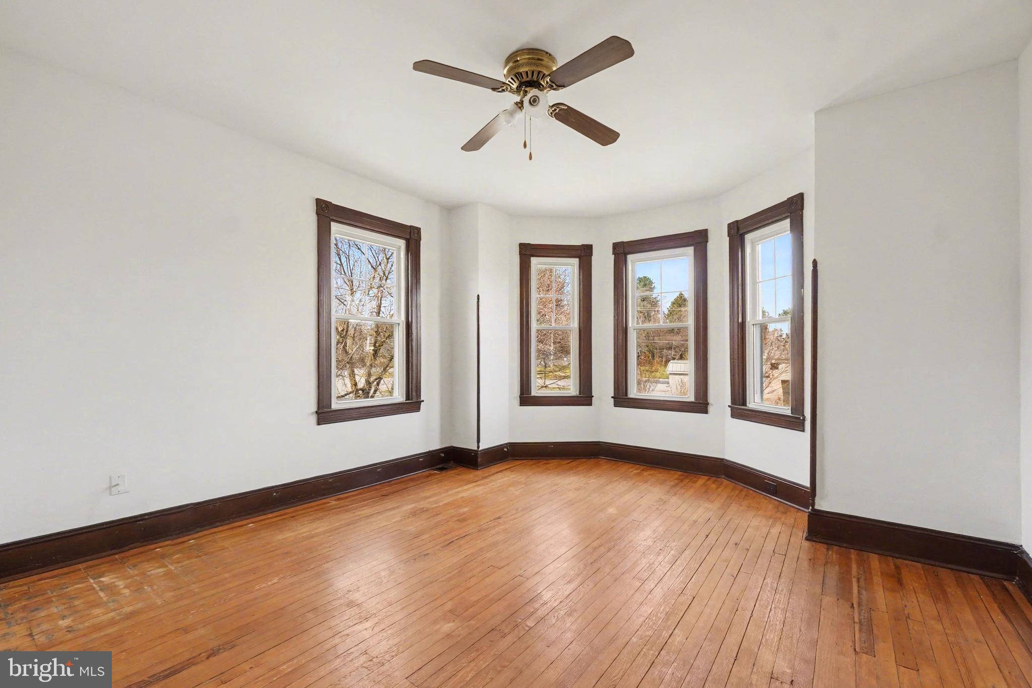 2322 Rock Spring Road Forest Hill, MD 21050 - Photo 24 of 39 a view of an empty room with a window and wooden floor