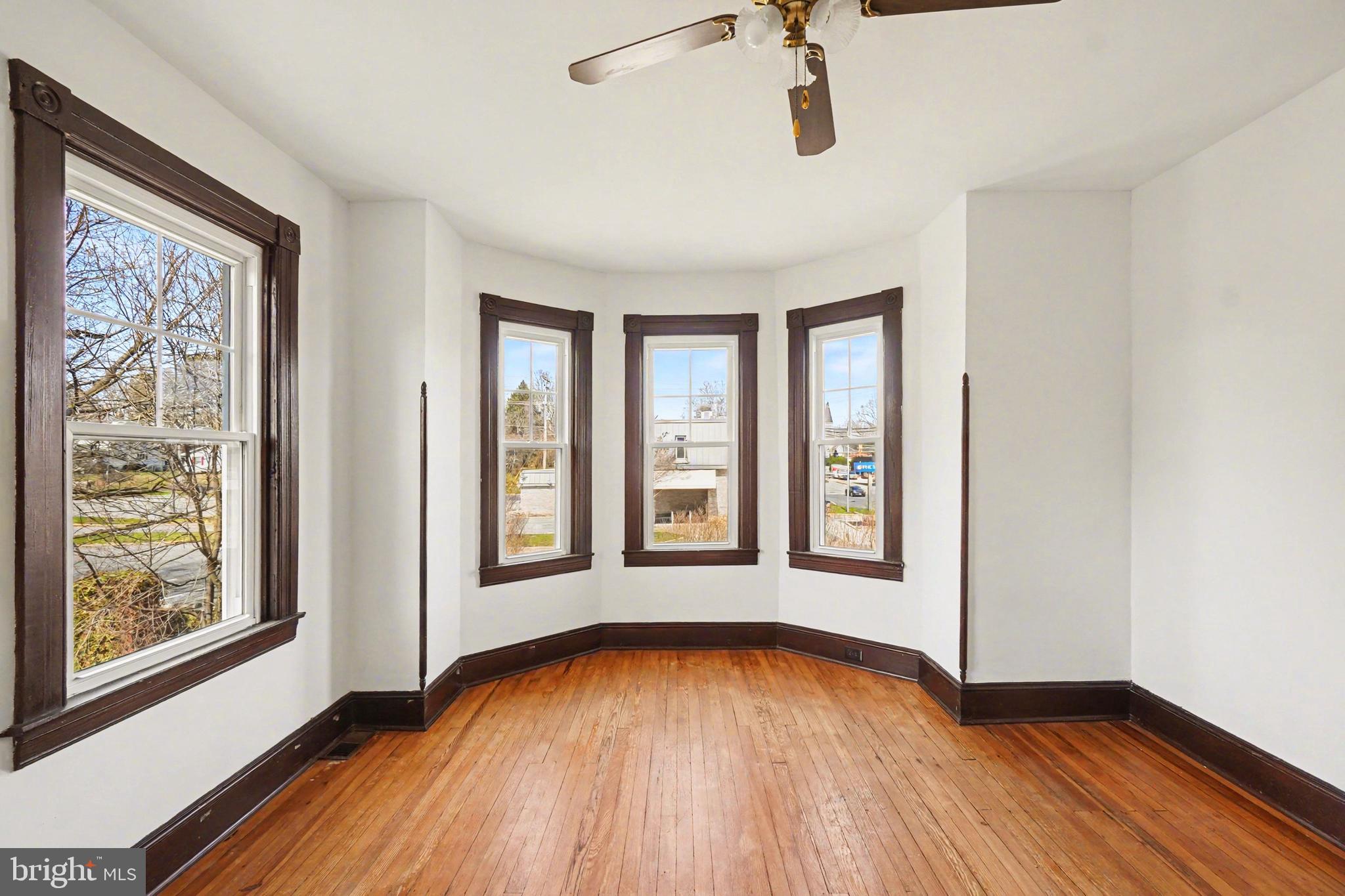 2322 Rock Spring Road Forest Hill, MD 21050 - Photo 25 of 39 an empty room with wooden floor and windows