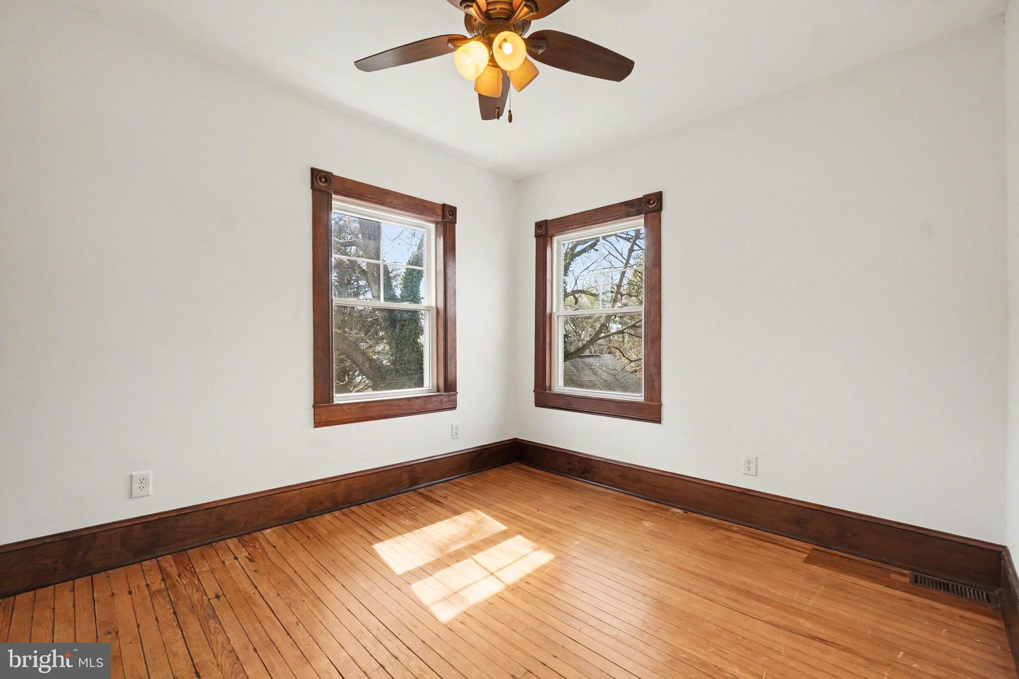 2322 Rock Spring Road Forest Hill, MD 21050 - Photo 34 of 39 a view of an empty room with window and wooden floor