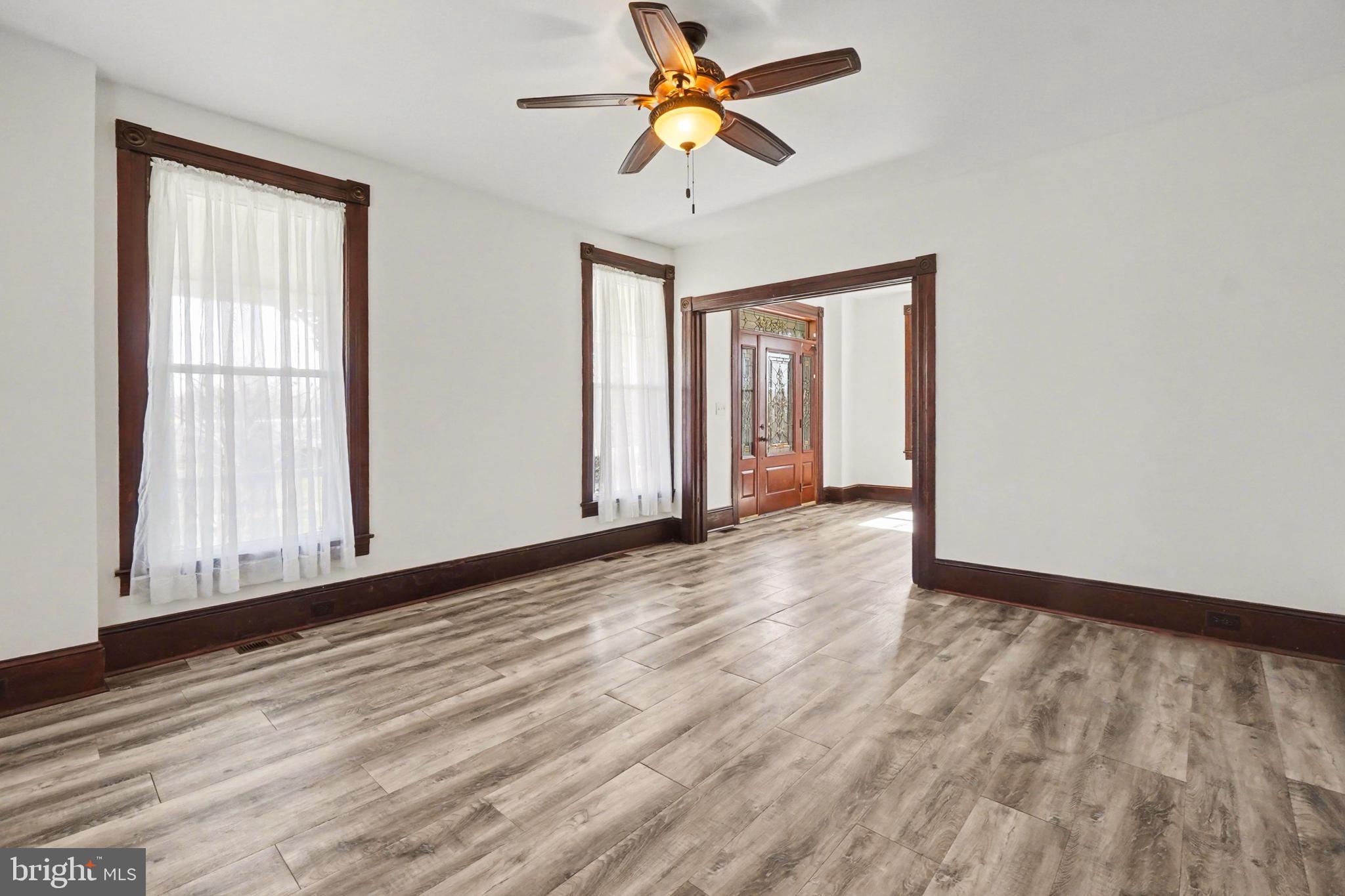 2322 Rock Spring Road Forest Hill, MD 21050 - Photo 8 of 39 a view of empty room with wooden floor and fan