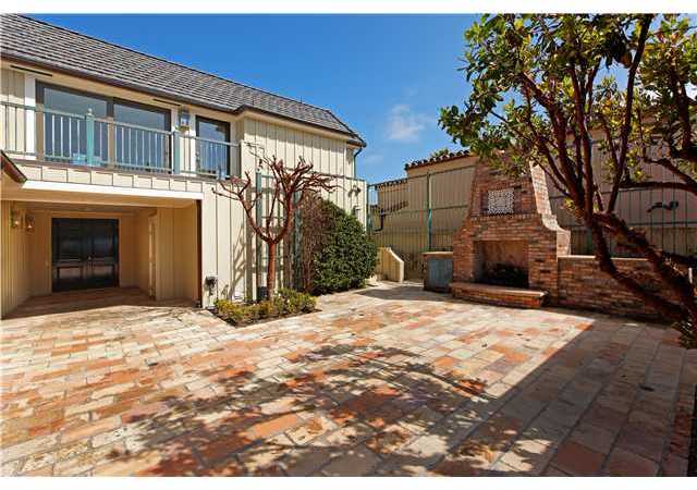 8460 El Paseo Grande La Jolla, CA 92037 - Photo 12 of 15 Interior courtyard with fireplace