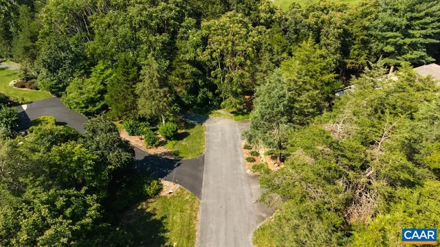 a view of a lake with a garden