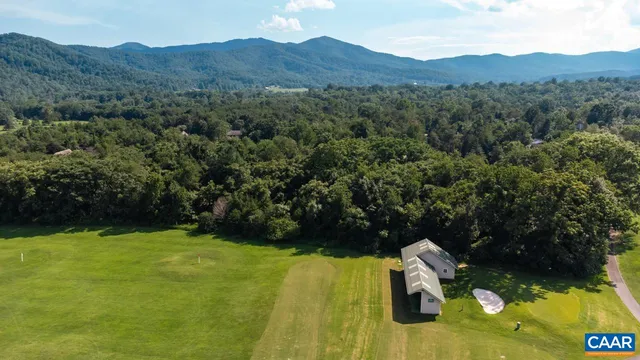 a view of a mountain with a garden