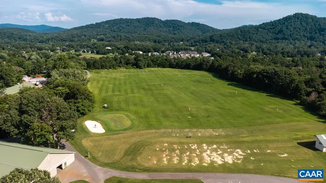 a view of a mountain with a swimming pool
